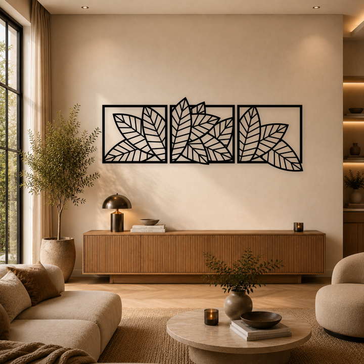 3-delige zwarte houten geometrische bladeren wanddecoratie boven dressoir in warme woonkamer
